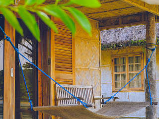 Veranda mit Hängematte · Tauchurlaub Ticao 